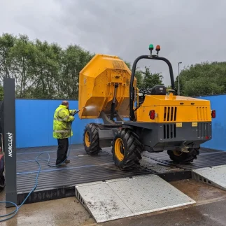 Man Washing Large Orange Plant flip